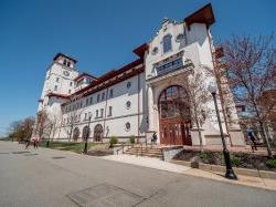 The outside of University Hall on a sunny day.