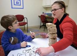 Teacher working with student on pronunciation