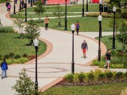 Students walking through campus near Cafe Diem and Memorial Auditorium