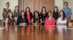 Photo of CREEHS faculty and staff in a classroom.