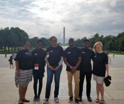 Students in front of reflecting pool and Washington Monument