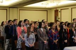 Students standing at award ceremony