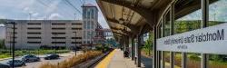 Montclair State 大学 at Little Falls train station platform with parking garage in background