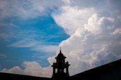 clouds in sky over Cole Hall bell tower