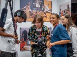 High school students use advanced cameras as part of the Sports Communication program during Pre-College Summer.