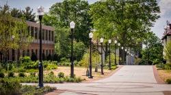 Photo of path near Partridge Hall on a sunny day.