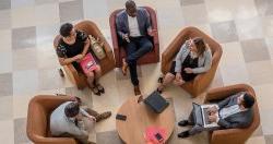 Graduate students in discussion on Montclair State campus