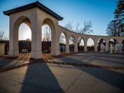 The outside of College Hall during sunset.