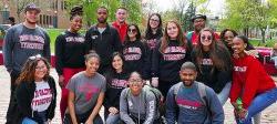 Group of students gathered in the Student Center Quad.