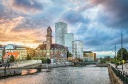 Beautiful cityscape with sunset over canal and skyline in Malmo, Sweden